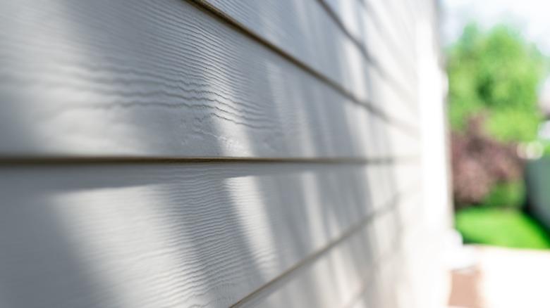 Closeup of sunlight on wood siding