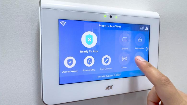 Finger on ADT panel touchscreen