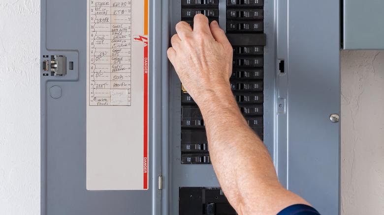 Resetting a circuit breaker in a residential circuit breaker panel