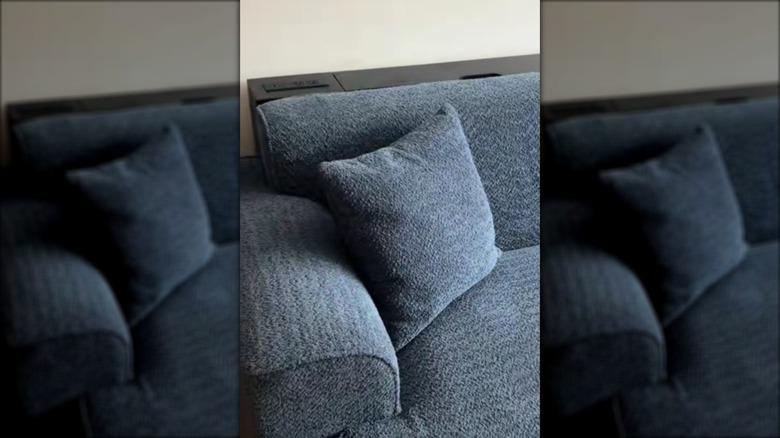 storage shelf behind couch