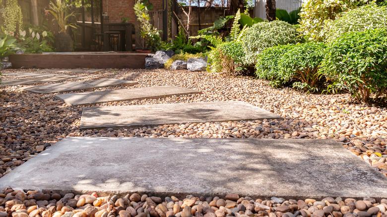 gravel pathway in backyard
