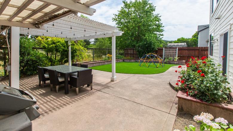 backyard with a lot of concrete and stone