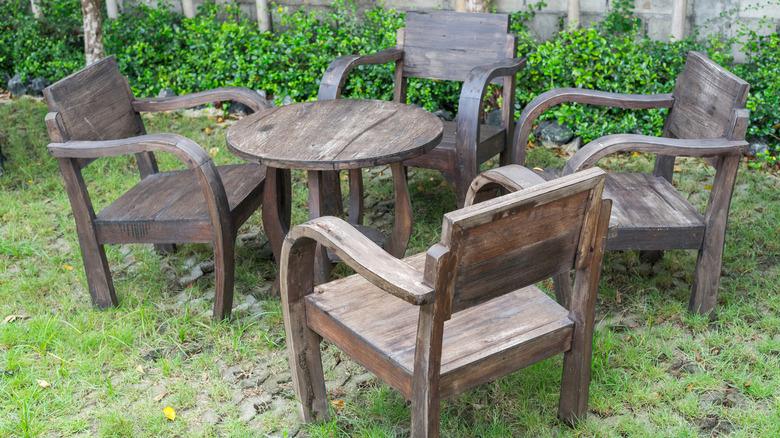 old wooden furniture sitting outside