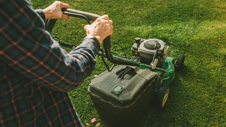 man mowing a lawn