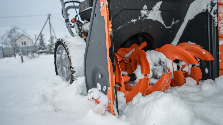 A closeup shot of a snow blower's augur drill.