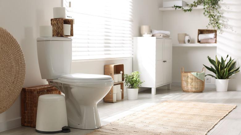 Clean bathroom with wicker decorations visible