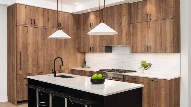 wood kitchen with black island