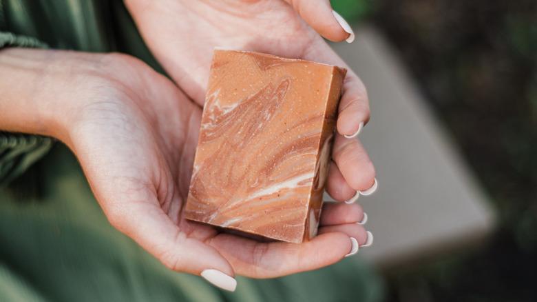 Woman holding soap