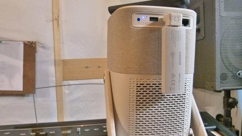 The Yaber Streaming Stick, a Google TV dongle, inconspicuously attached to the back of the T2
