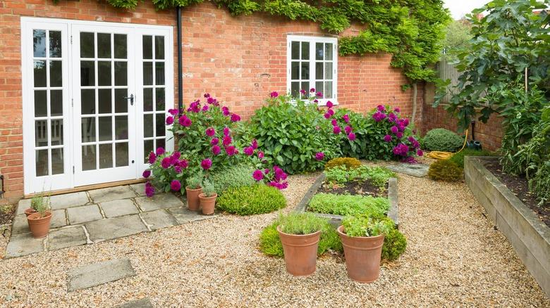 Gravel patio behind home