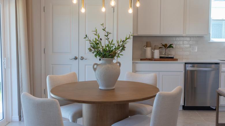 Small dining nook in kitchen with table and chairs