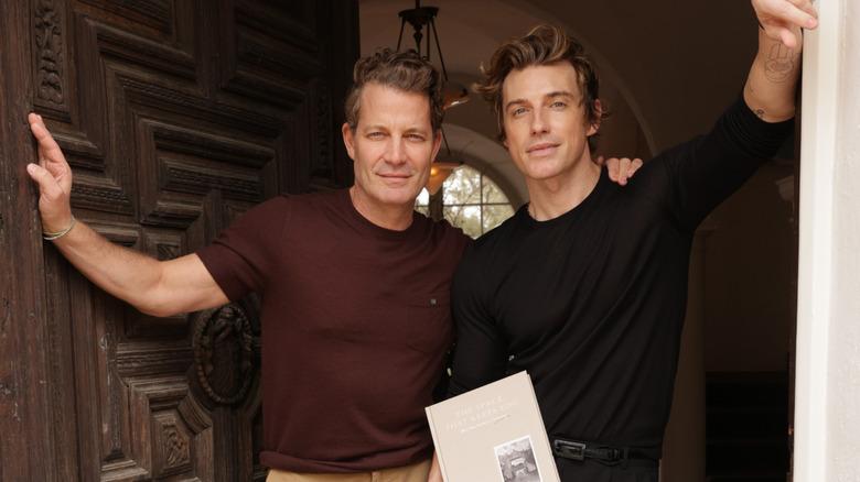 Nate Berkus and Jeremiah Brent posing at an open door