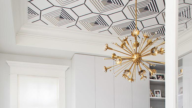 White and blue office with white and blue graphic ceiling