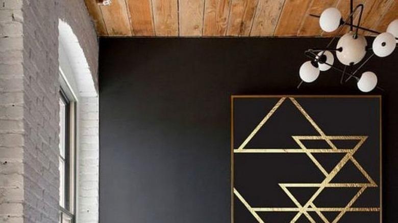 Bedroom with wooden ceiling and black wall