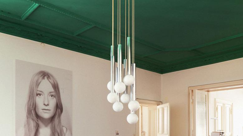 Dining room featuring forrest green ceiling