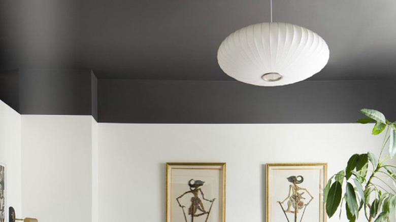 Bedroom featuring matching gray bedding and ceiling