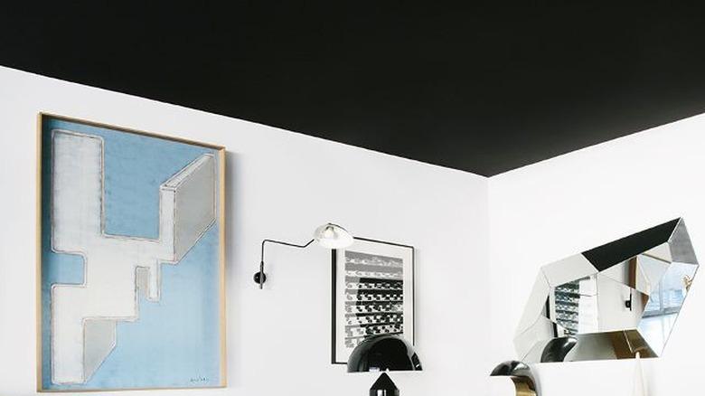 Elegant living room with matte black ceiling