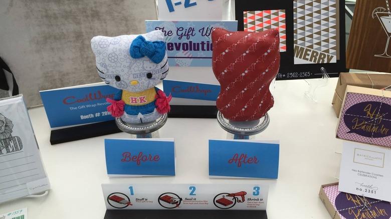 demonstration of CoolWraps wrapped gift before and after at a trade show booth
