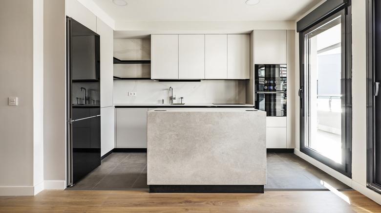 modern kitchen with black kitchen appliances