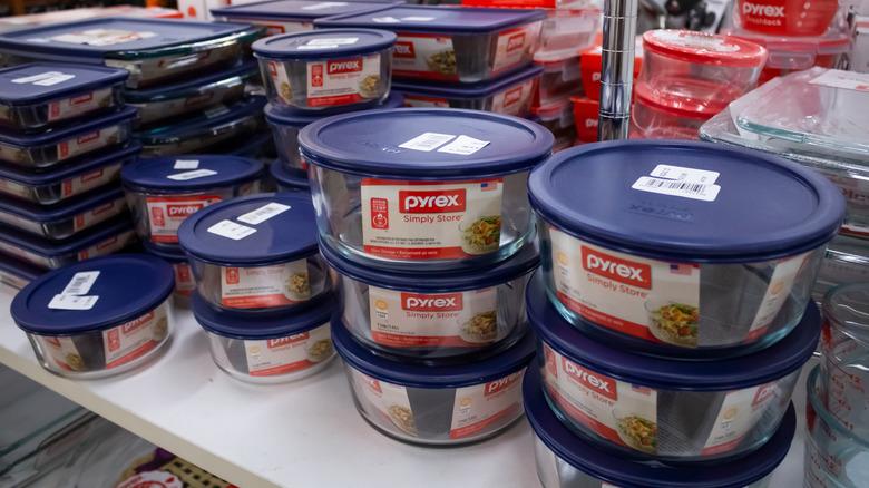 pyrex food containers on a shelf for sale